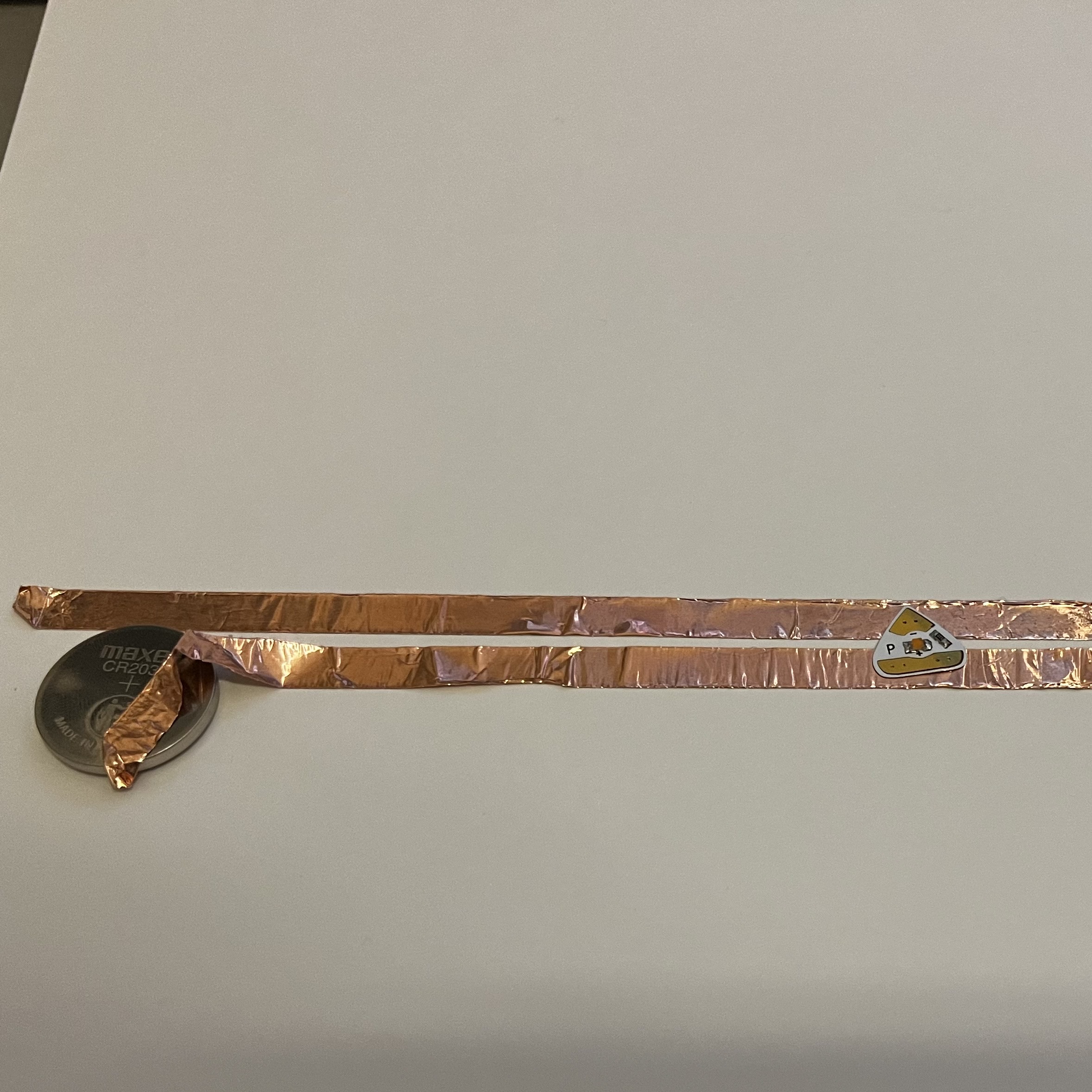 I started with the tutorial, created this simple circuit with copper tape