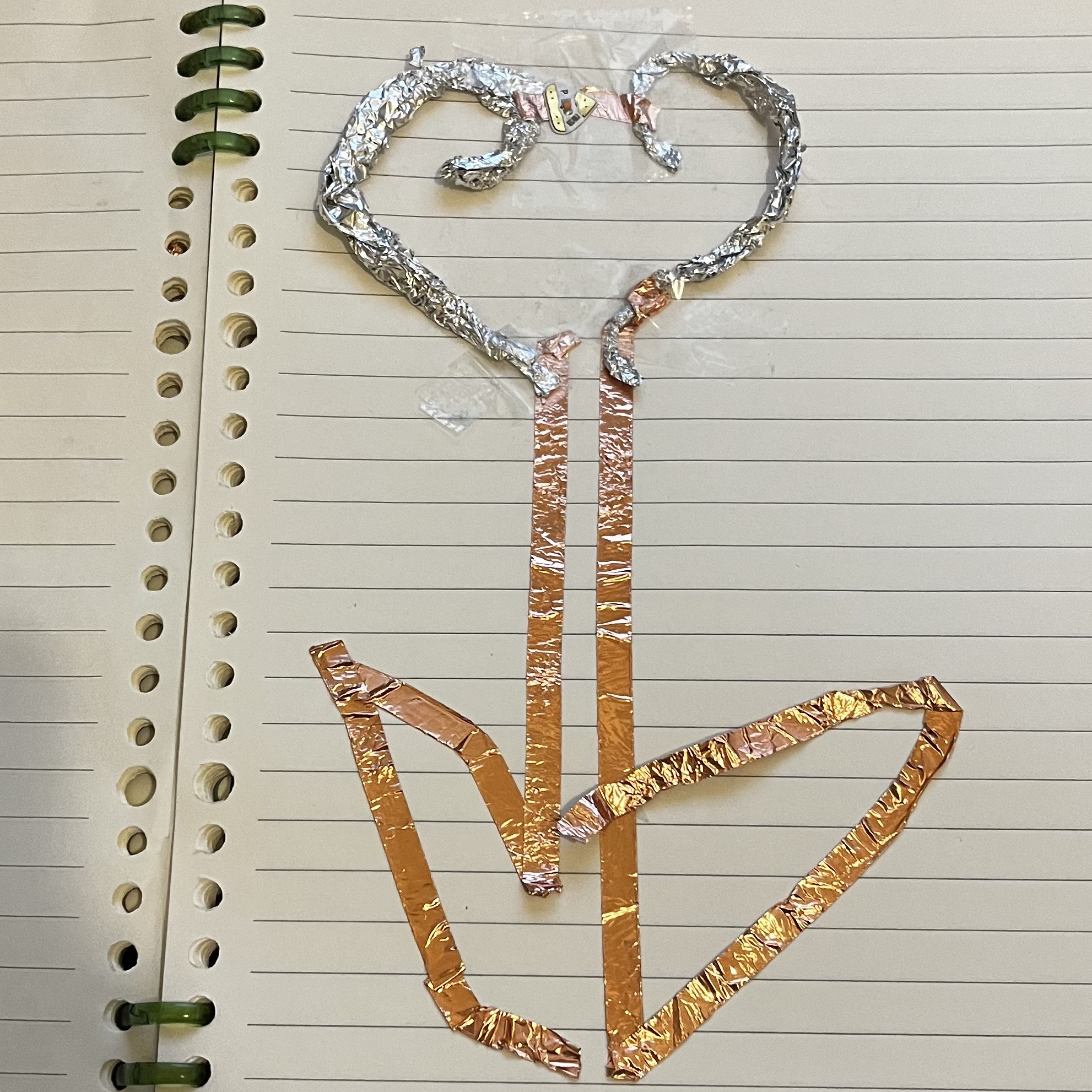 The flower circuit. I placed the LED on the bud, each leaf serves as each terminal.